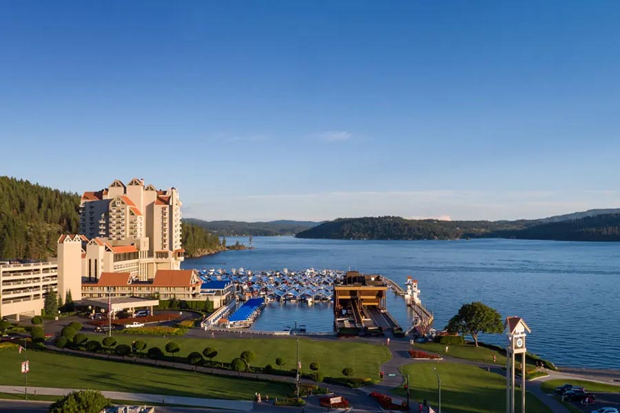 Coeur dAlene Resort view with a river and mountains in the background